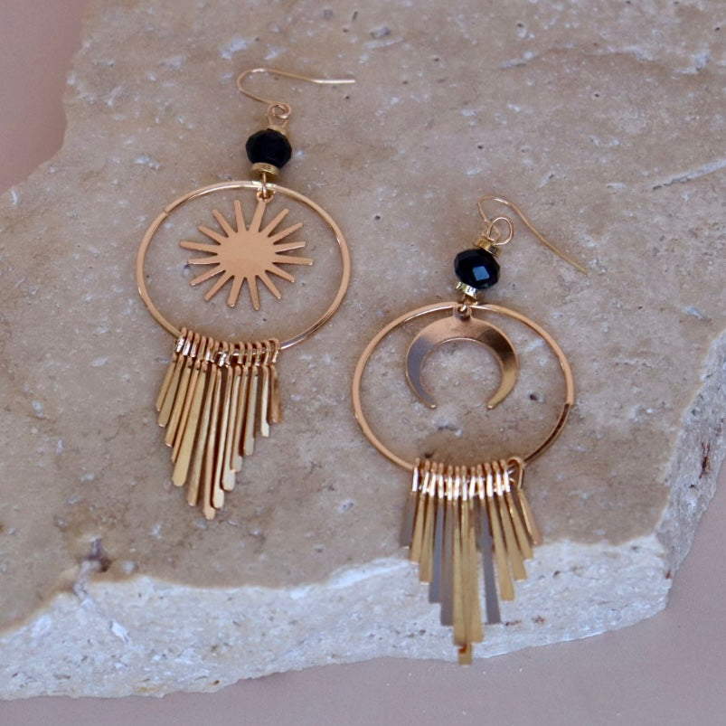 Golden bohemian style jewellery earrings with a moon and sun
